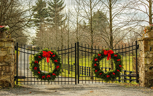 Christmas Wreath on the Front Gates of Driveway